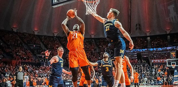 Jon Teske (15), Zavier Simpson (3), and Franz Wagner (21)