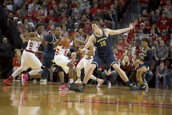 Muhammad-Ali Abdur-Rahkman (12), Jon Teske (15), and Isaiah Livers (4)