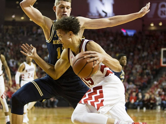 Moritz Wagner (13) and Zavier Simpson (3)