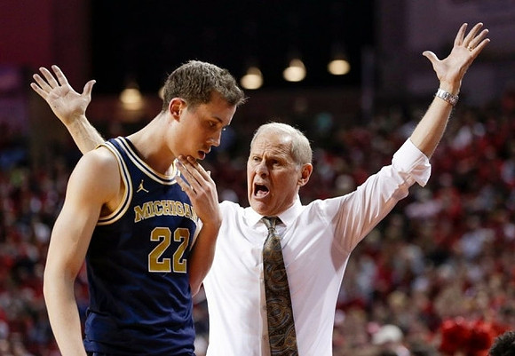 Duncan Robinson (22) and John Beilein