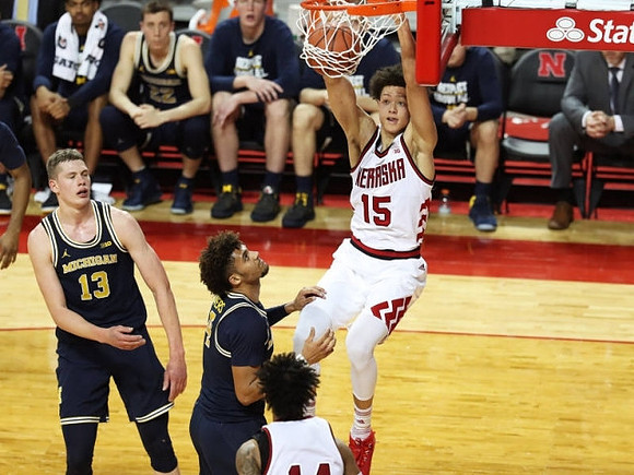 Moritz Wagner (13) and Isaiah Livers (4)