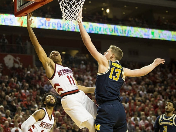Moritz Wagner (13) and Zavier Simpson (3)