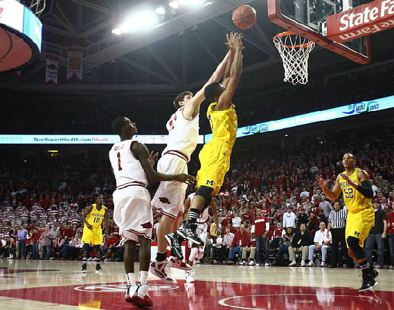 Tim Hardaway Jr. (10), Trey Burke (3), and Jordan Morgan (52)