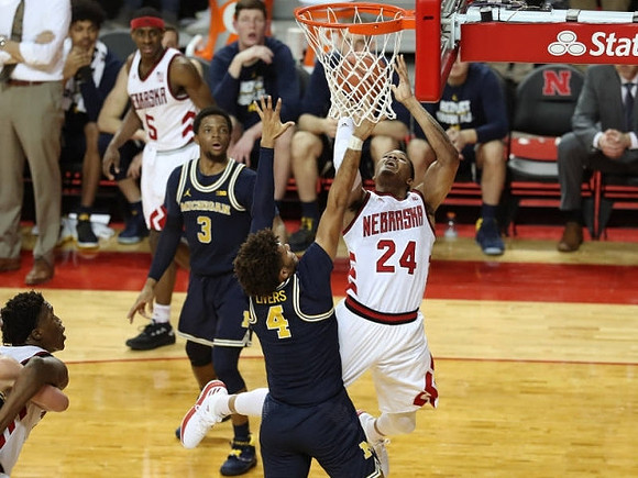 Zavier Simpson (3) and Isaiah Livers (4)