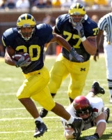 Michael Hart (20) and Jake Long (77)