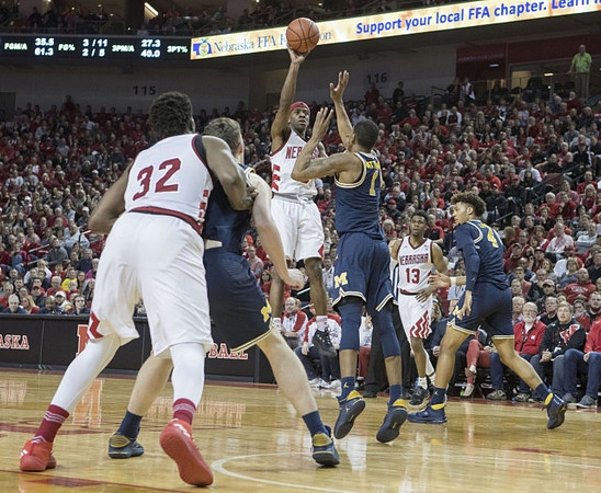 Duncan Robinson (22), Charles Matthews (1), and Isaiah Livers (4)