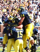 Steve Breaston (15), Mark Bihl (54), and Braylon Edwards (1)