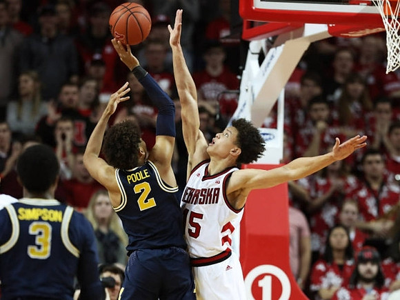 Zavier Simpson (3) and Jordan Poole (2)