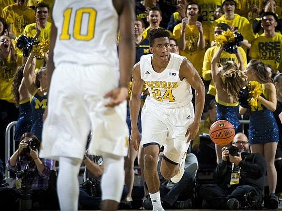 Derrick Walton Jr. (10) and Aubrey Dawkins (24)