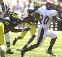 Pierre Woods (99) and Ernest Shazor (25)