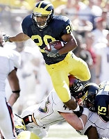 Michael Hart (20) and Steve Breaston (15)