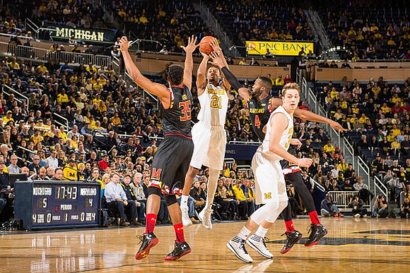 Zak Irvin (21) and Mark Donnal (34)