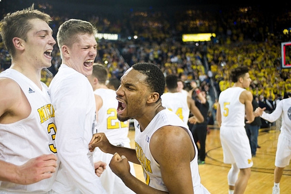 Mark Donnal (34), Moritz Wagner (13), Zak Irvin (21), and D.J. Wilson (5)