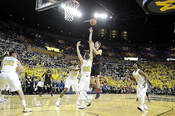 Ricky Doyle (32), Zak Irvin (21), Duncan Robinson (22), and Derrick Walton Jr. (10)