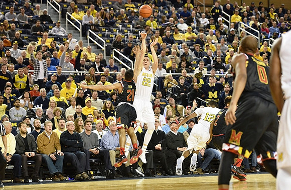 Duncan Robinson (22) and Muhammad-Ali Abdur-Rahkman (12)