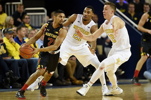 Zak Irvin (21) and Duncan Robinson (22)