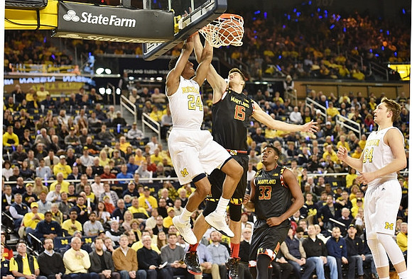 Aubrey Dawkins (24) and Mark Donnal (34)
