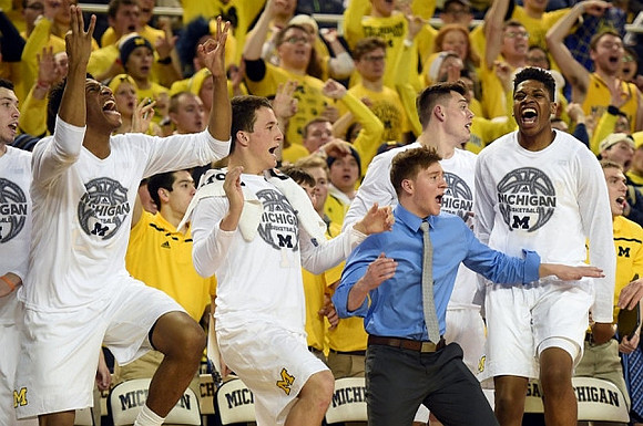 Aubrey Dawkins (24), Andrew Dakich (11), Spike Albrecht (2), Ricky Doyle (32), and Kameron Chatman (3)