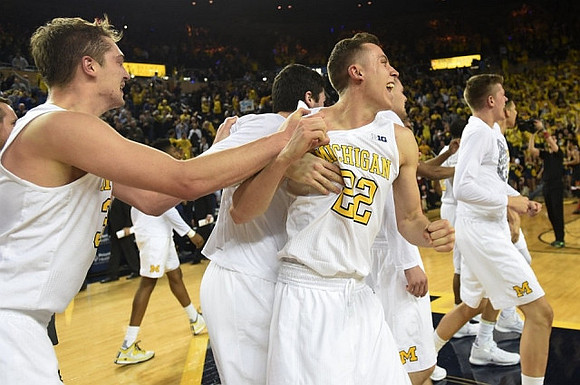 Mark Donnal (34), Duncan Robinson (22), and Moritz Wagner (13)