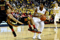 Derrick Walton Jr. (10) and Mark Donnal (34)