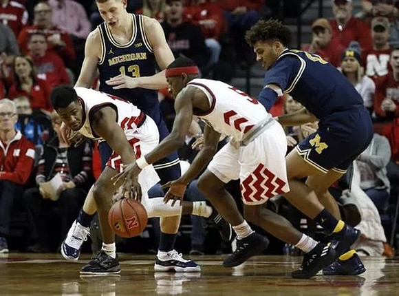 Moritz Wagner (13) and Isaiah Livers (4)