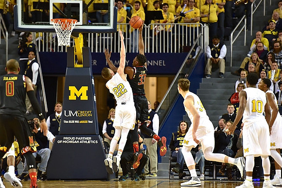 Duncan Robinson (22), Mark Donnal (34), Derrick Walton Jr. (10), and Zak Irvin (21)