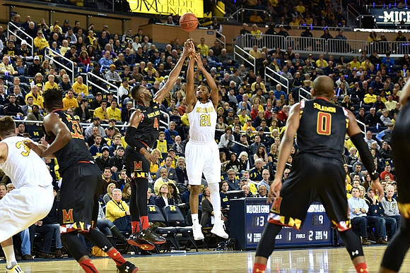 Mark Donnal (34) and Zak Irvin (21)