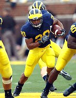 Michael Hart, Chad Henne, and Obi Oluigbo
