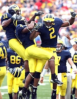 Darnell Hood, Brandent Englemon, Shawn Crable, Zoltan Mesko, and Mario Manningham