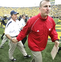Lloyd Carr, Bret Bielema, and Brandon Graham