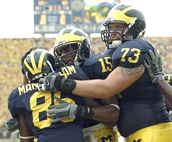 Mario Manningham, Steve Breaston, and Alex Mitchell