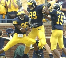 Mario Manningham, Tyler Ecker, and Steve Breaston