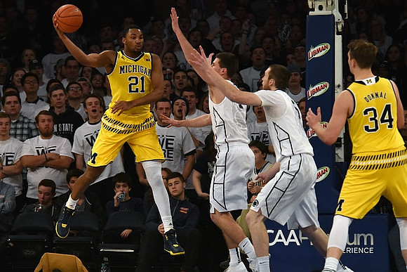 Zak Irvin (21) and Mark Donnal (34)