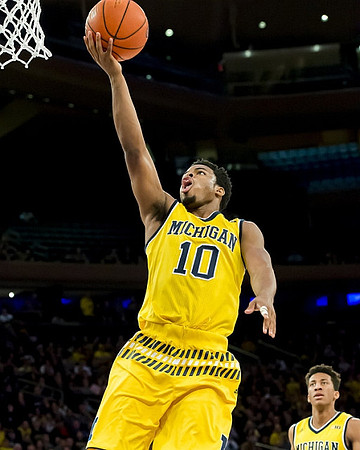 Derrick Walton Jr. (10) and Aubrey Dawkins (24)