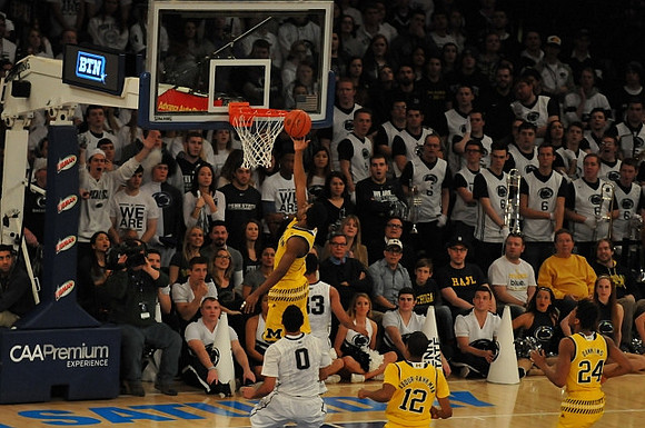 Derrick Walton Jr. (10), Muhammad-Ali Abdur-Rahkman (12), and Aubrey Dawkins (24)