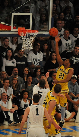 Mark Donnal (34) and Zak Irvin (21)