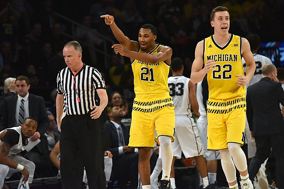 Zak Irvin (21) and Duncan Robinson (22)