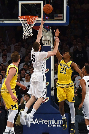 Mark Donnal (34) and Zak Irvin (21)
