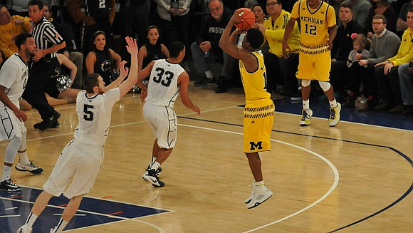 Derrick Walton Jr. (10) and Muhammad-Ali Abdur-Rahkman (12)