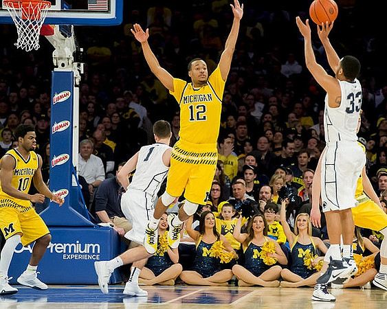 Derrick Walton Jr. (10) and Muhammad-Ali Abdur-Rahkman (12)