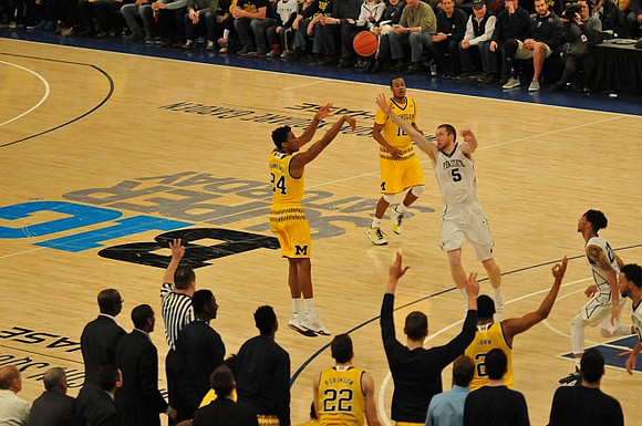 Aubrey Dawkins (24), Duncan Robinson (22), Muhammad-Ali Abdur-Rahkman (12), and Zak Irvin (21)