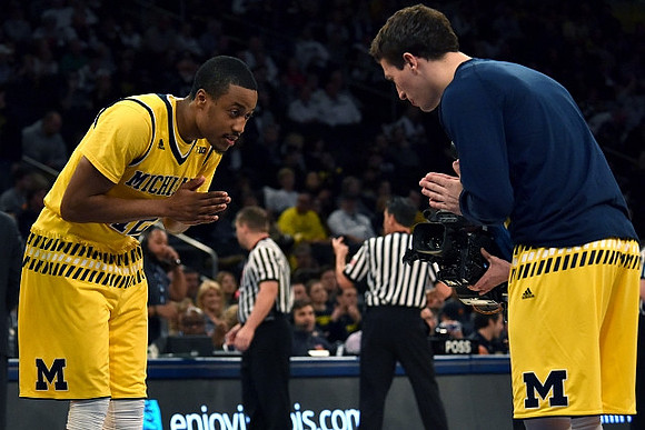 Muhammad-Ali Abdur-Rahkman (12) and Andrew Dakich (11)