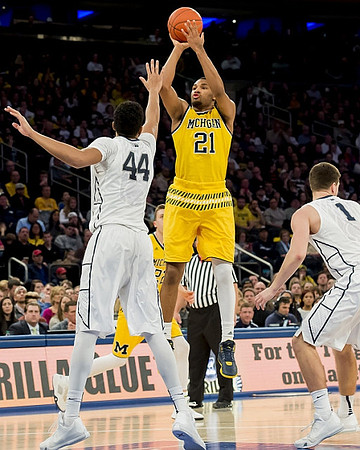 Zak Irvin (21) and Duncan Robinson (22)