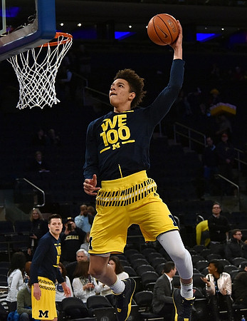 Brent Hibbitts (0) and D.J. Wilson (5)