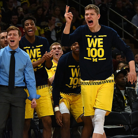 Spike Albrecht (2), Aubrey Dawkins (24), Kameron Chatman (3), and Moritz Wagner (13)