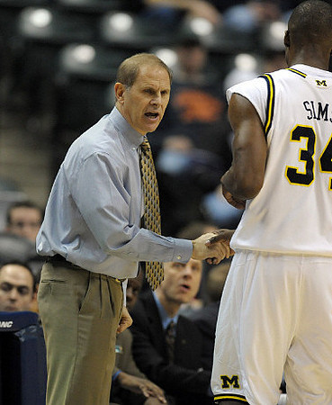 DeShawn Sims (34) and John Beilein