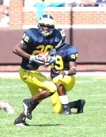 Julius Curry (26) and Pierre Woods (99)