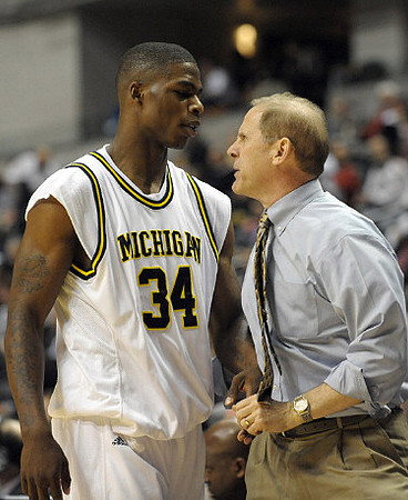 DeShawn Sims (34) and John Beilein