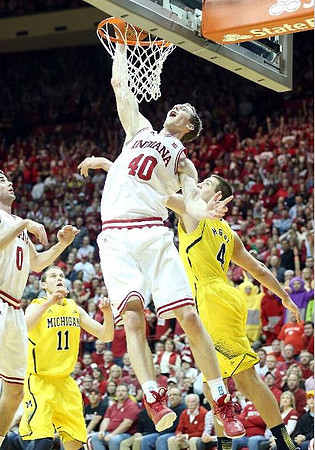 Nik Stauskas (11) and Mitch McGary (4)