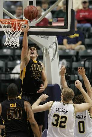 Zack Gibson (32) and Zack Novak (0)